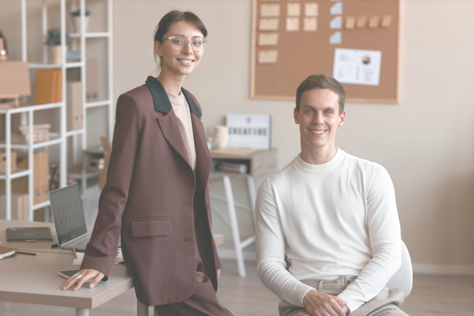 Financial calculator and charts showing business performance metrics